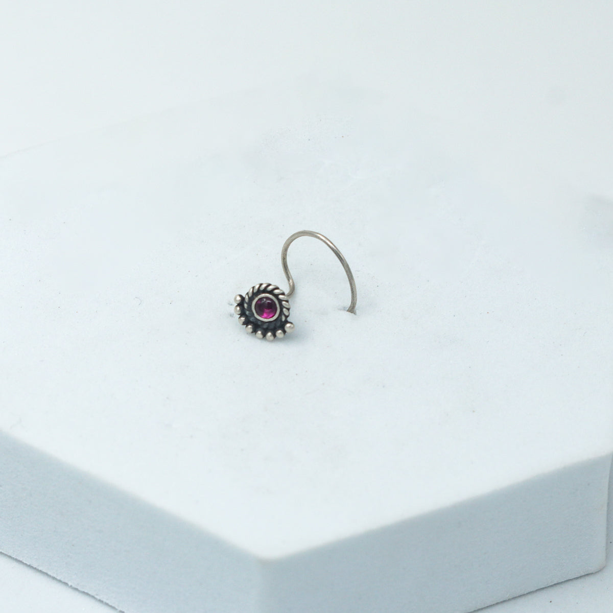 Small crescent silver nose pin design