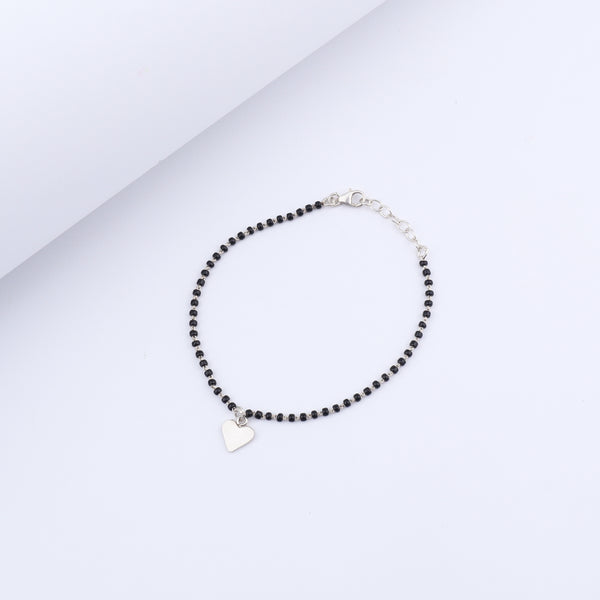 Silver Charm Mangalsutra bracelet with black beads and heart pendant