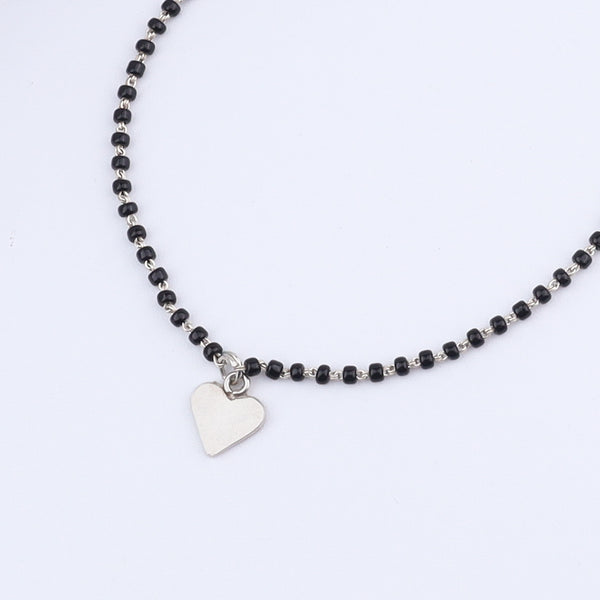Silver Charm Mangalsutra bracelet with black beads and heart pendant