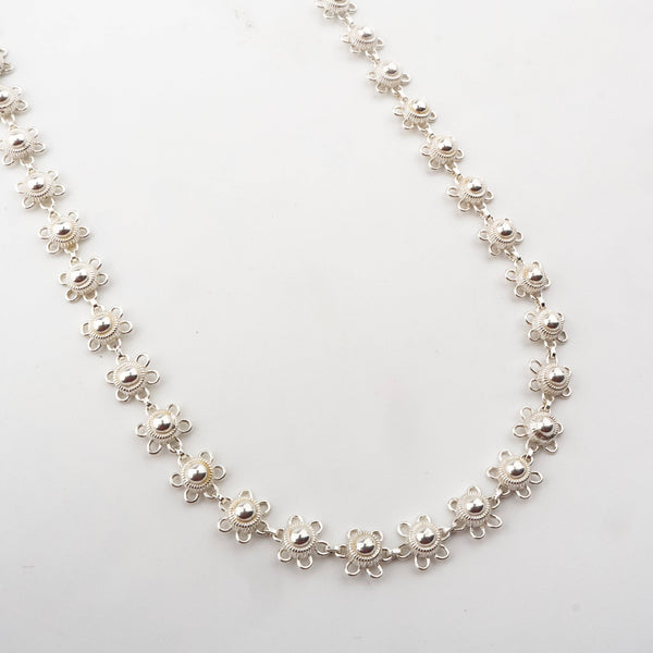 Silver floral charm necklace