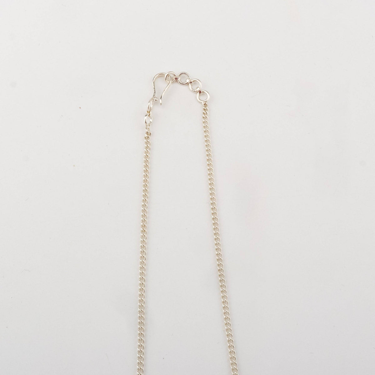 Silver long necklace with floral charms