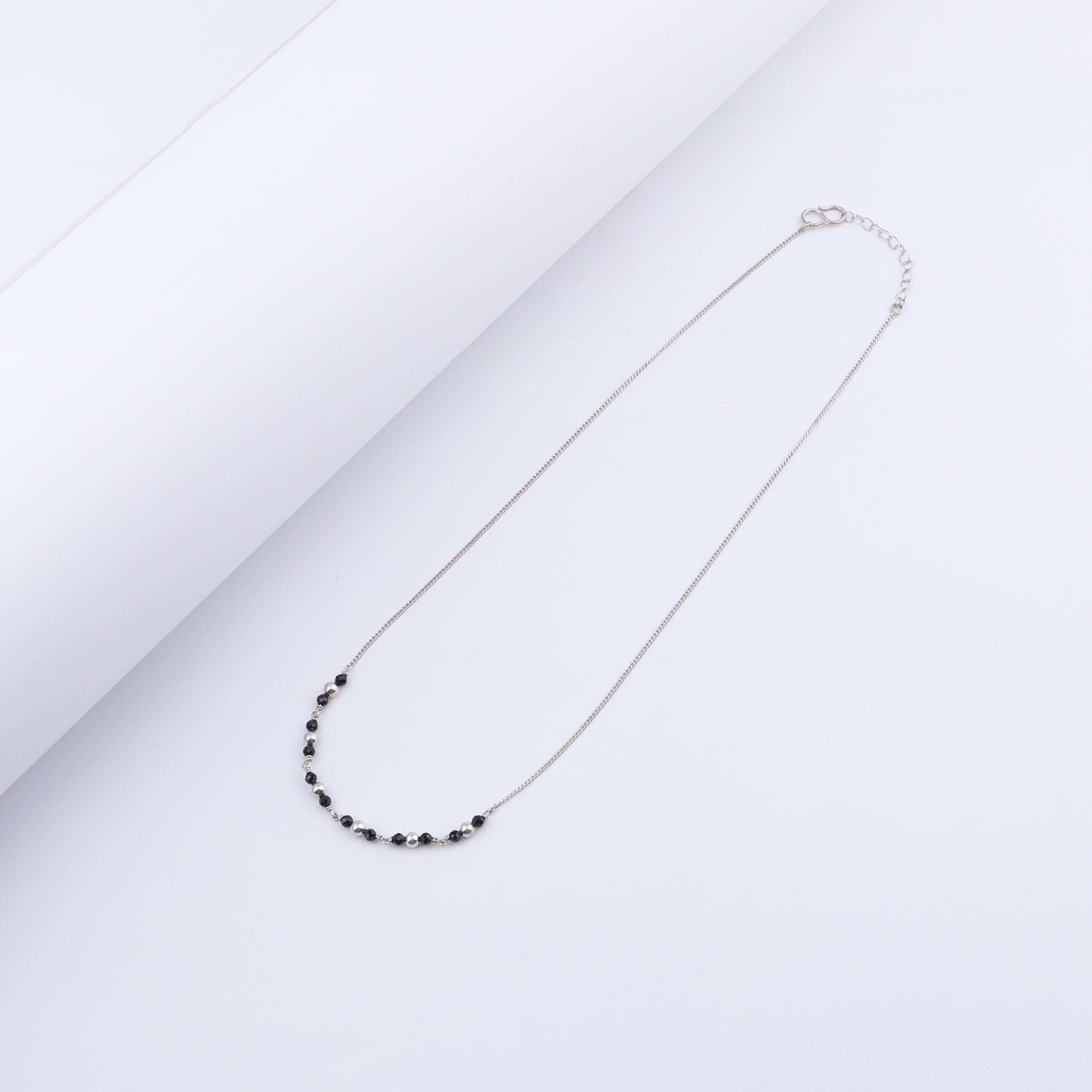 style silver black beads mangalsutra with saree