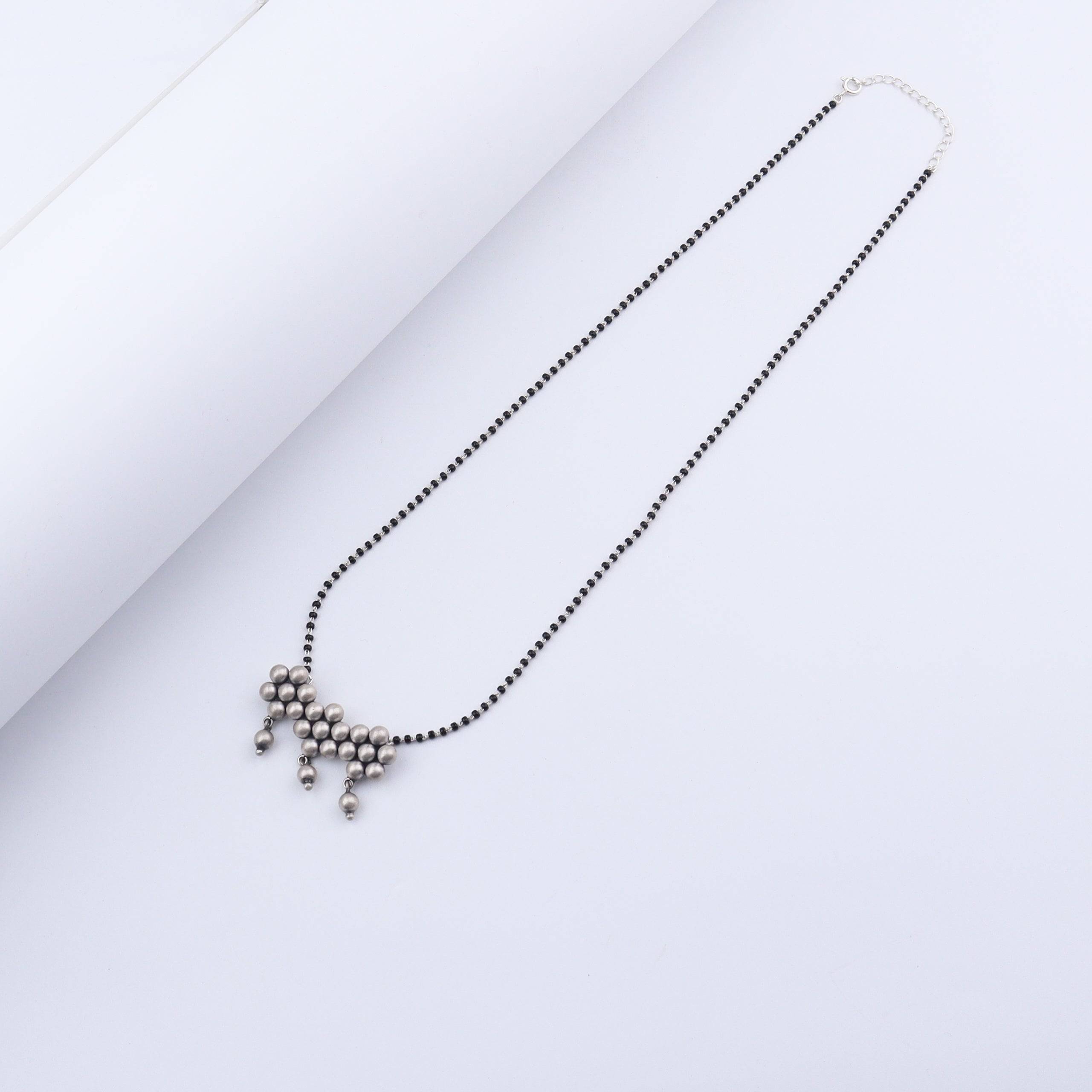 Angled side view of Silver Kudi Mangalsutra in sterling silver