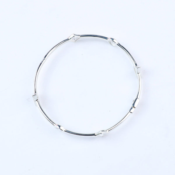 Angled side view of Silver CZ Openable Bangle open mechanism