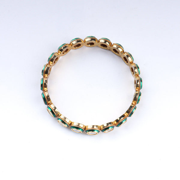 Detailed view of a 22K gold-plated fashion bangle (single) highlighting intricate motifs, textured detailing, and a premium 22K gold-plated finish