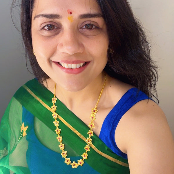 Gold-plated Prajakta flower necklace set with floral motifs
