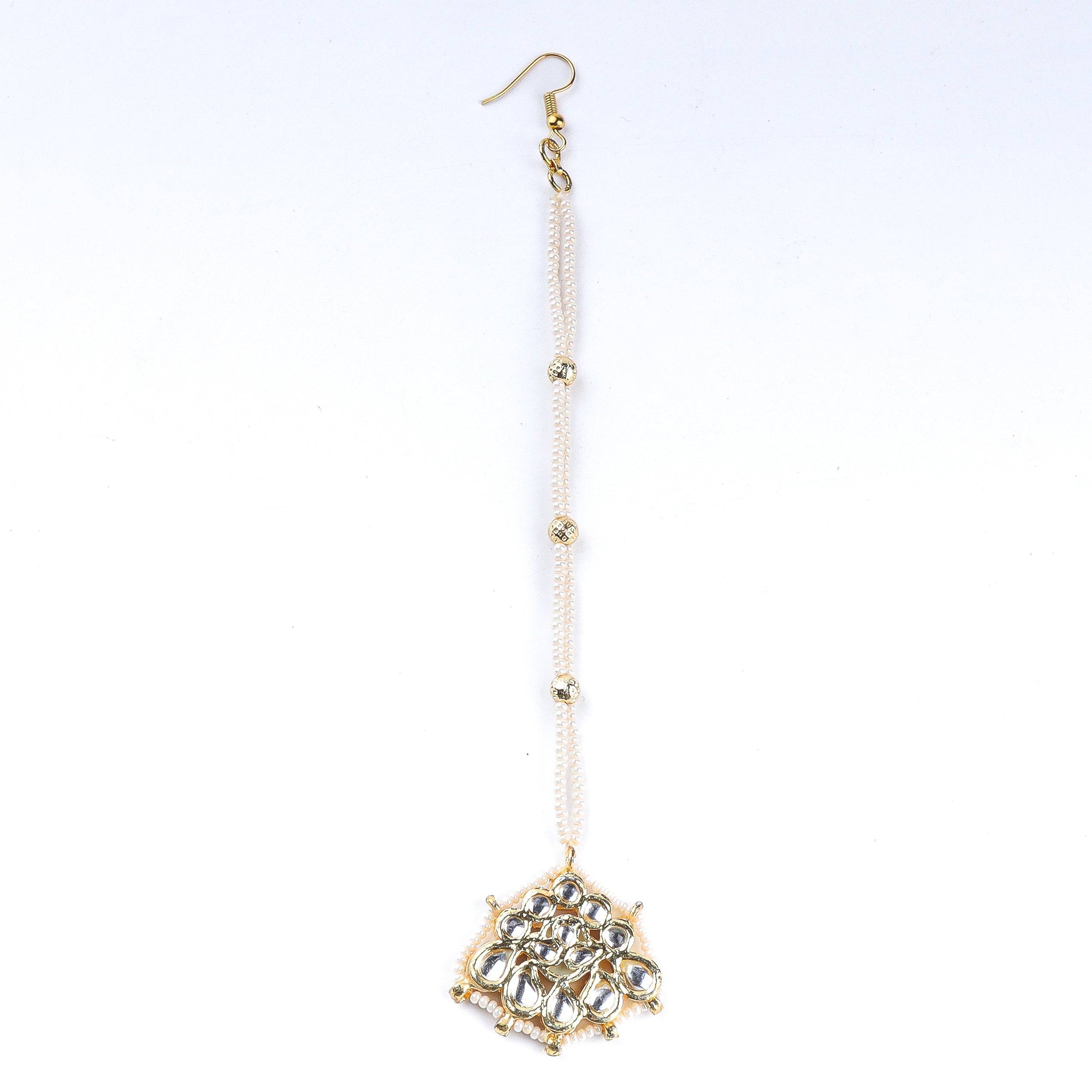 Detailed view of 22K gold-plated fashion maang tika highlighting intricate motifs, textured detailing, and premium 22K gold-plated finish