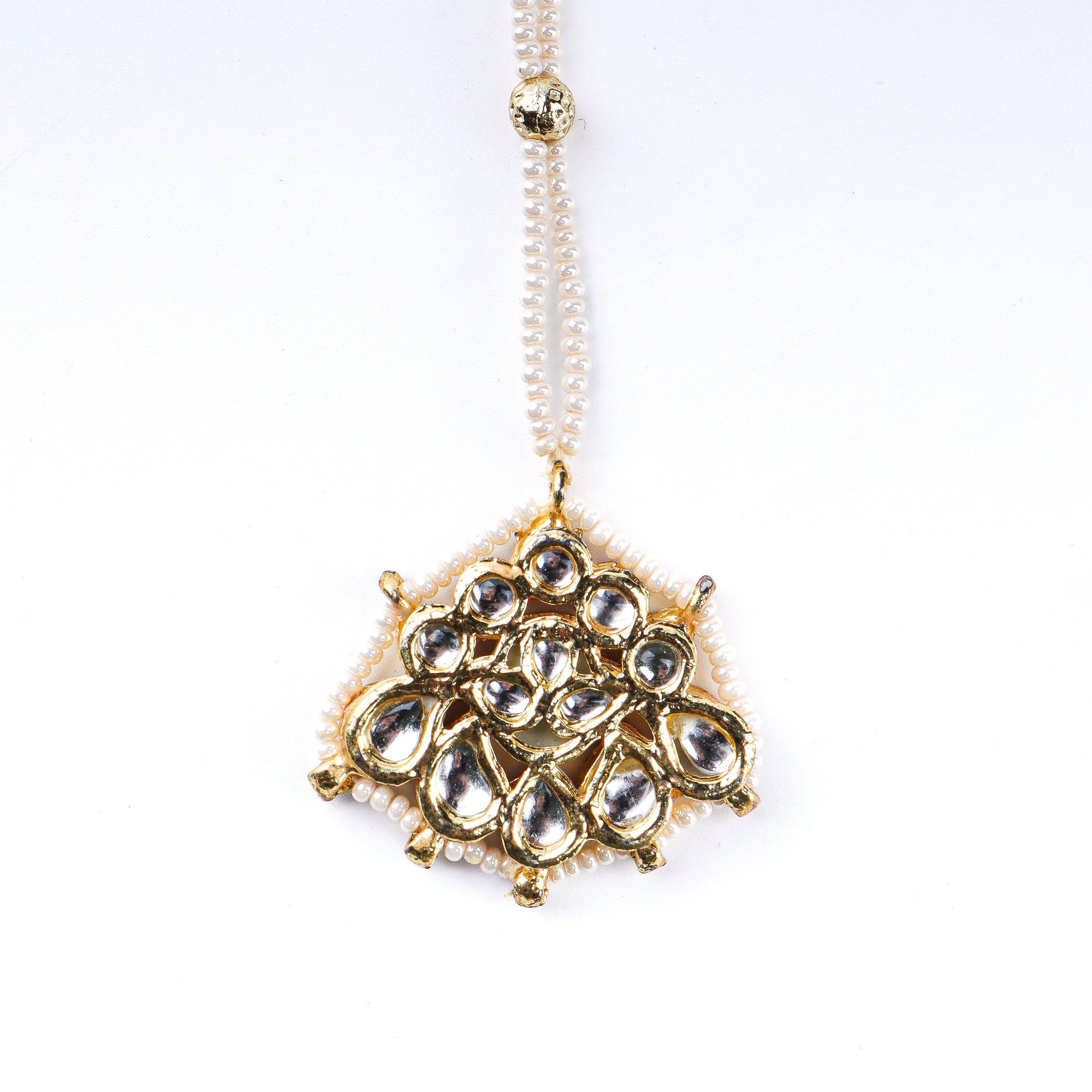 Close-up of 22K gold-plated fashion maang tika showcasing intricate detailing, fine craftsmanship, and rich 22K gold plating