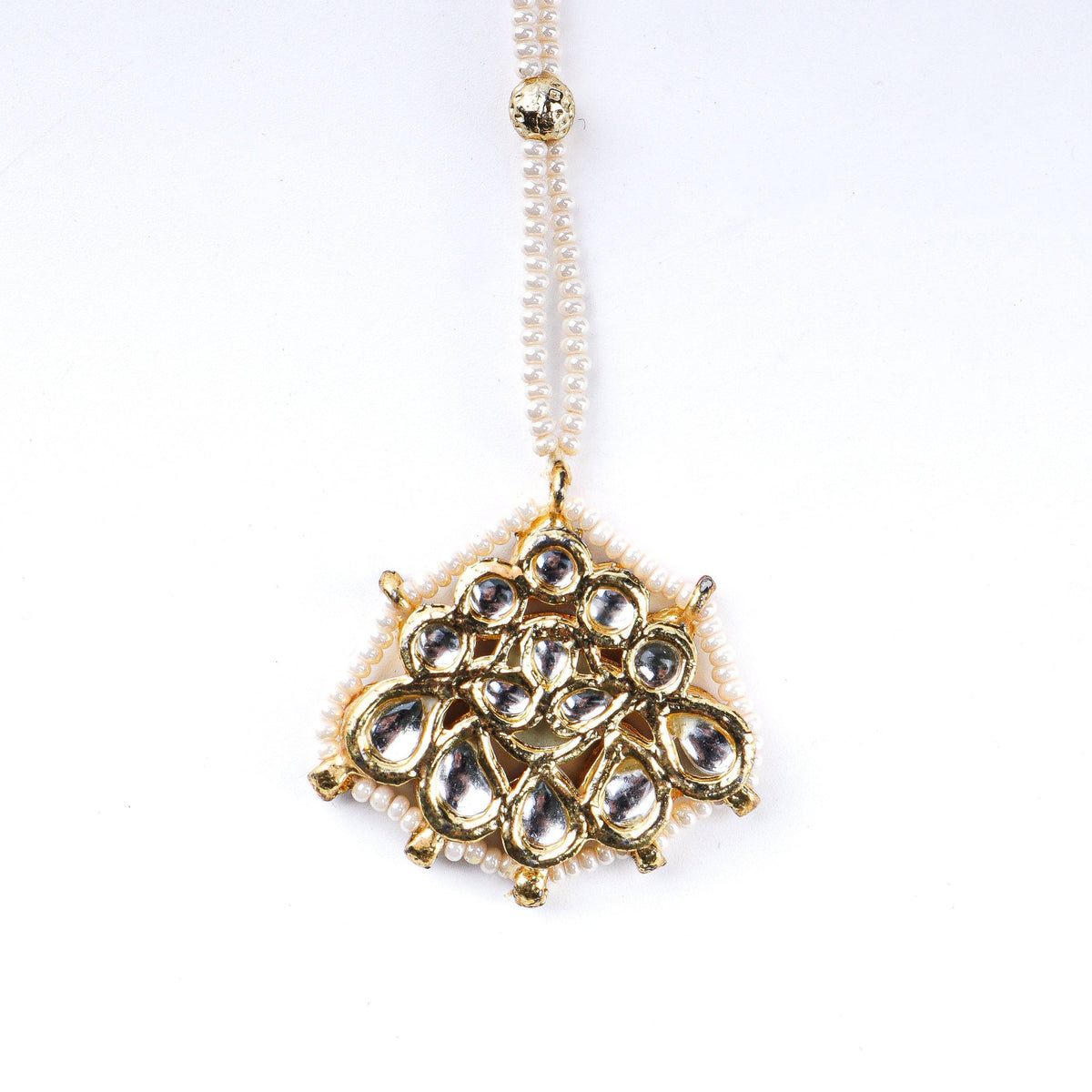 Close-up of 22K gold-plated fashion maang tika showcasing intricate detailing, fine craftsmanship, and rich 22K gold plating