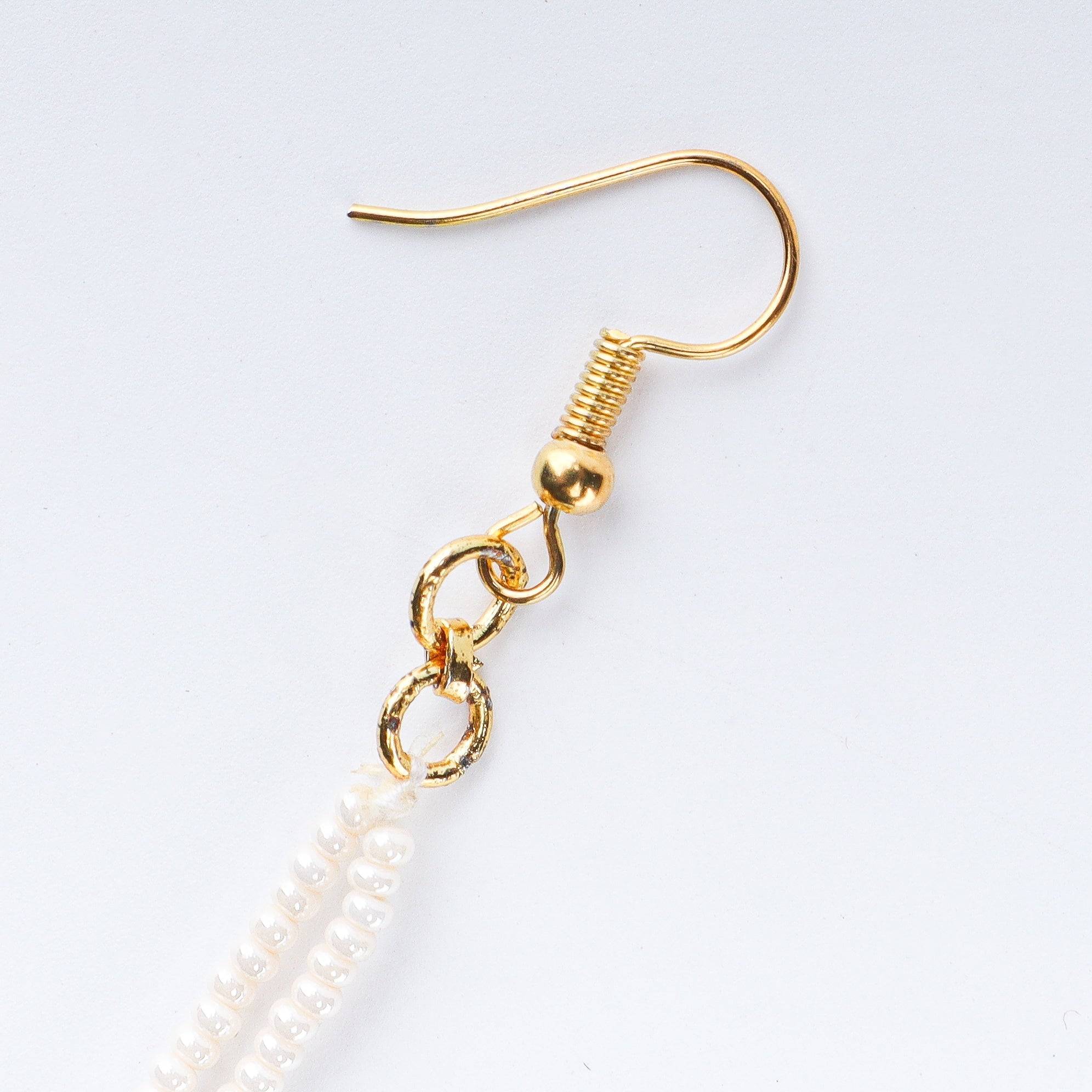 Angled view of 22K gold-plated fashion maang tika highlighting its elegant structure and polished gold finish