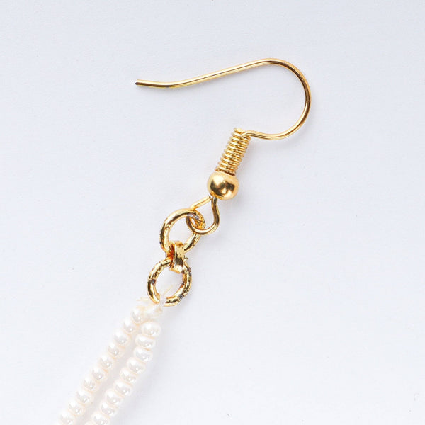 Angled view of 22K gold-plated fashion maang tika highlighting its elegant structure and polished gold finish