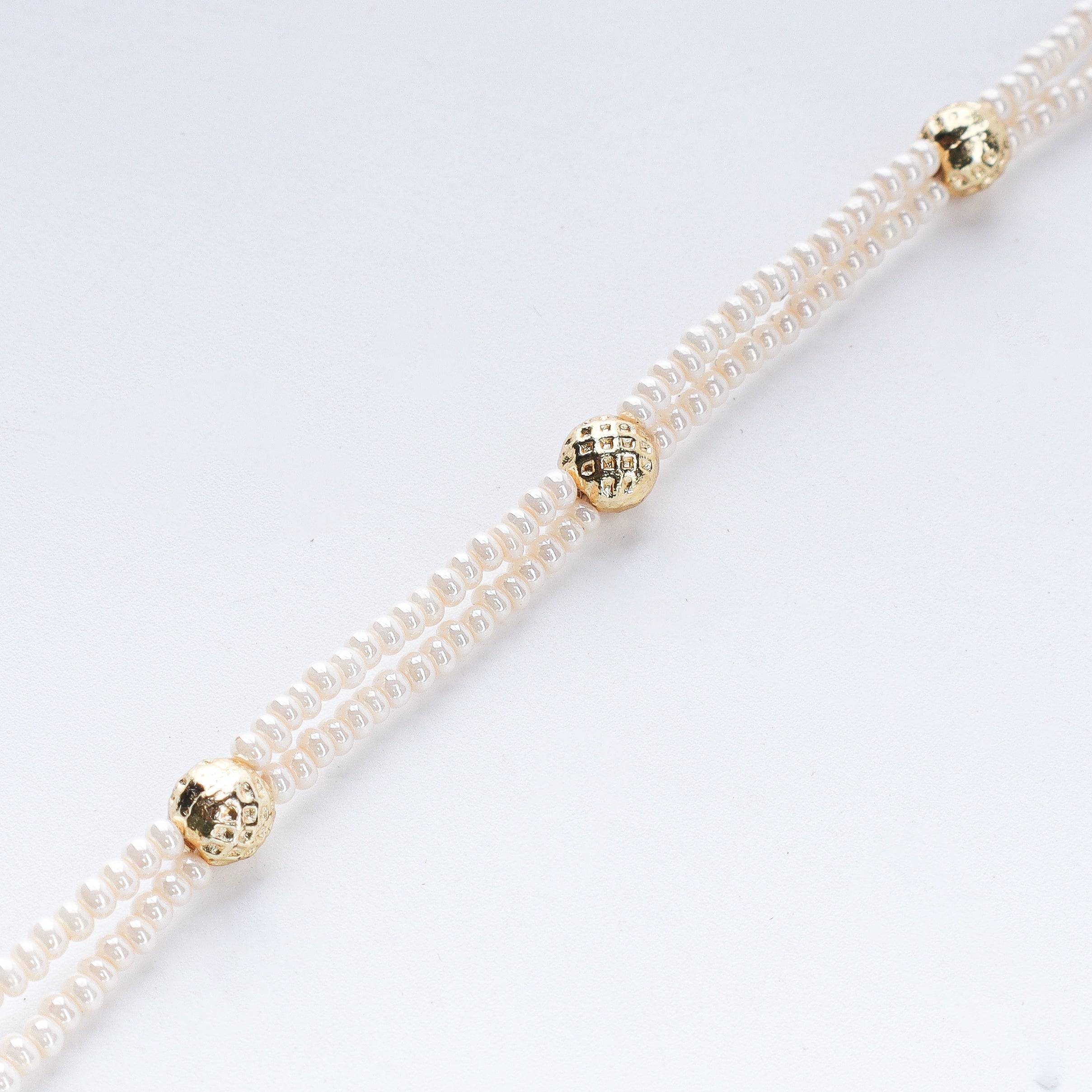 The model is wearing 22K gold-plated fashion maang tika for an elegant traditional jewelry look
