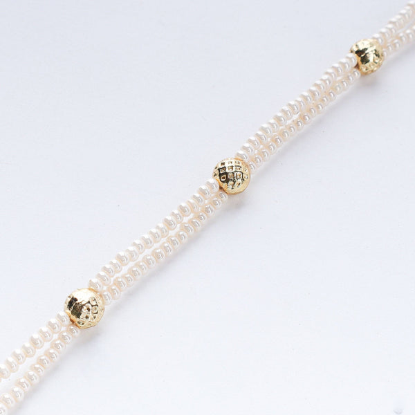 The model is wearing 22K gold-plated fashion maang tika for an elegant traditional jewelry look