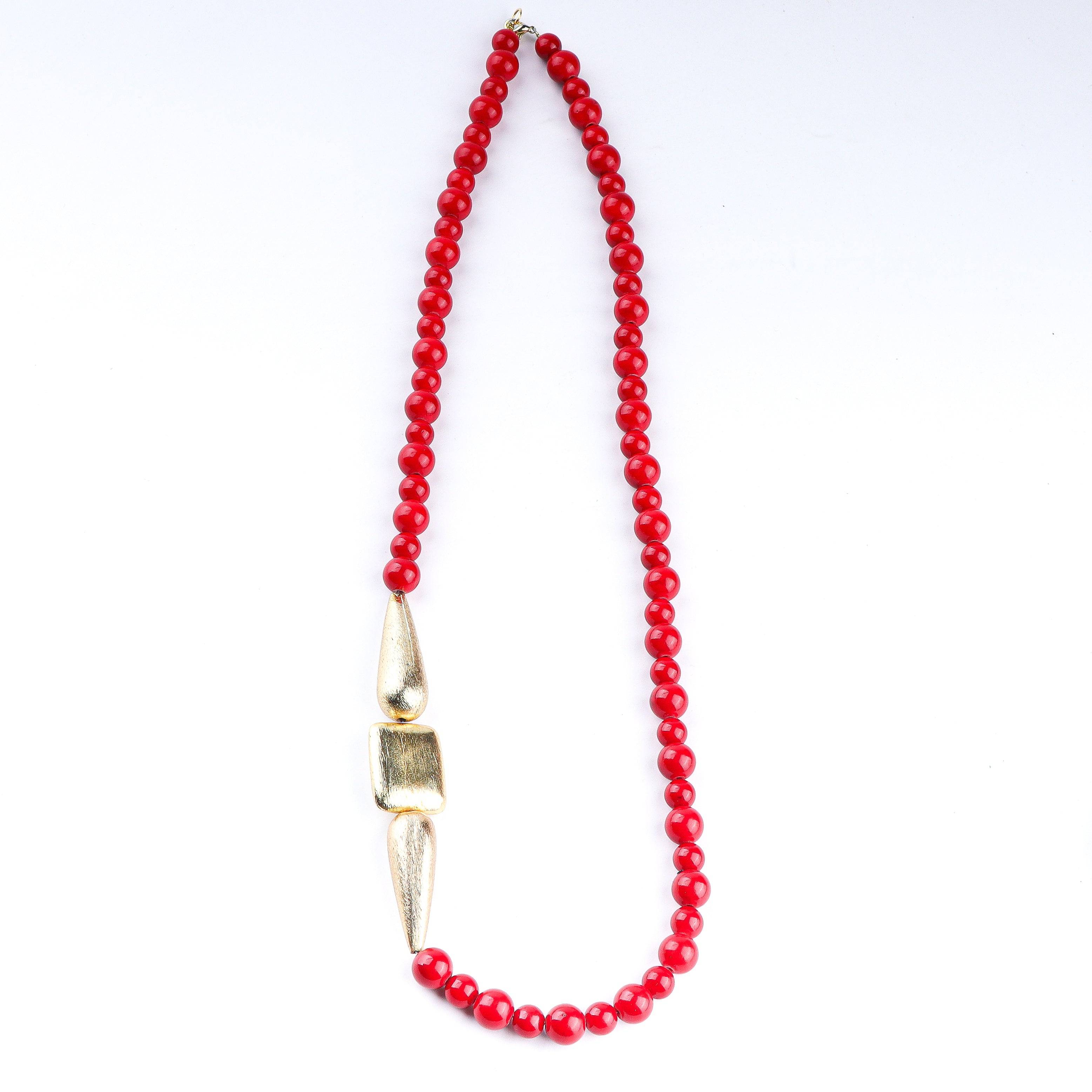 Detailed view of a 22K gold-plated fashion necklace highlighting intricate motifs, textured detailing, and a premium 22K gold-plated finish