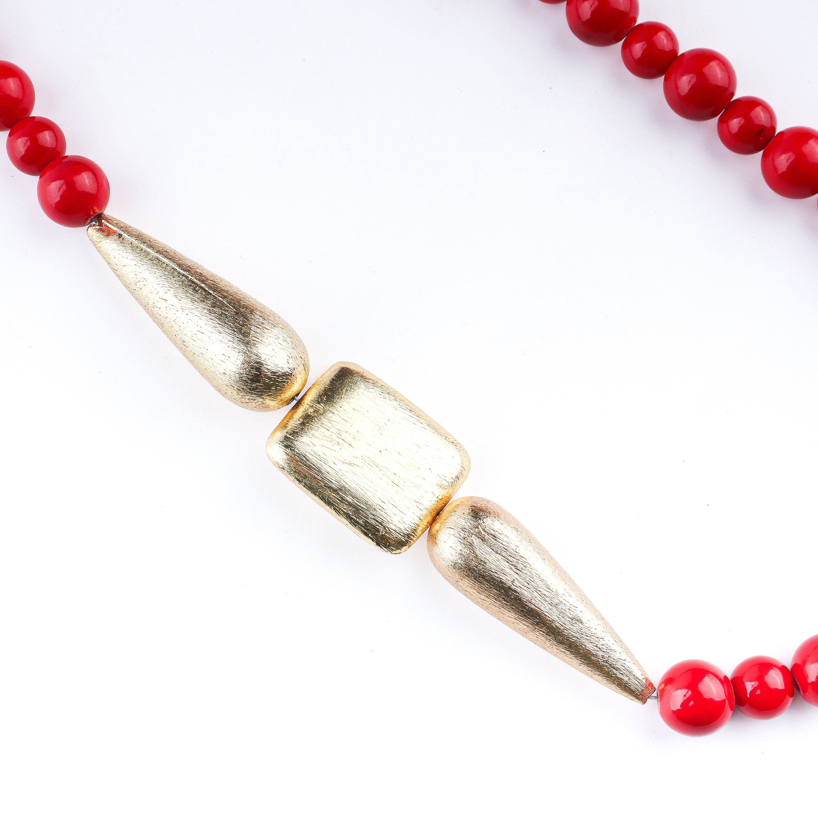 Close-up of a 22K gold-plated fashion necklace showcasing intricate detailing, fine craftsmanship, and rich 22K gold plating