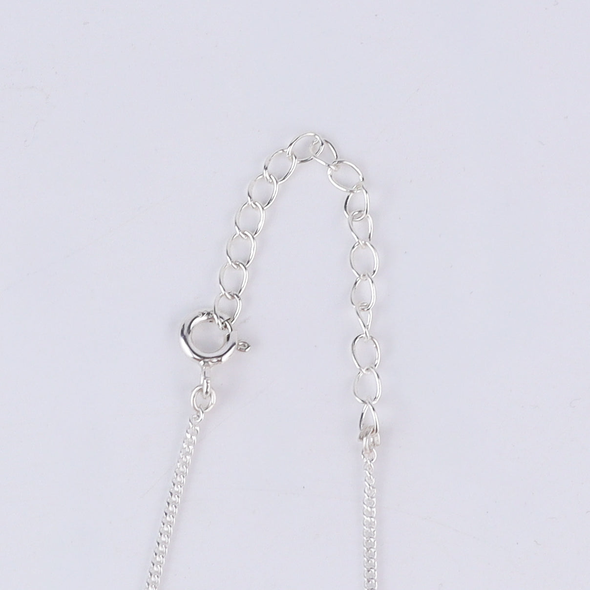 wear small tic tac toe pendant necklace for everyday styling