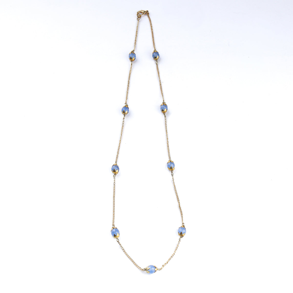 Detailed view of a 22K gold-plated fashion necklace highlighting intricate motifs, textured detailing, and premium 22K gold-plated finish