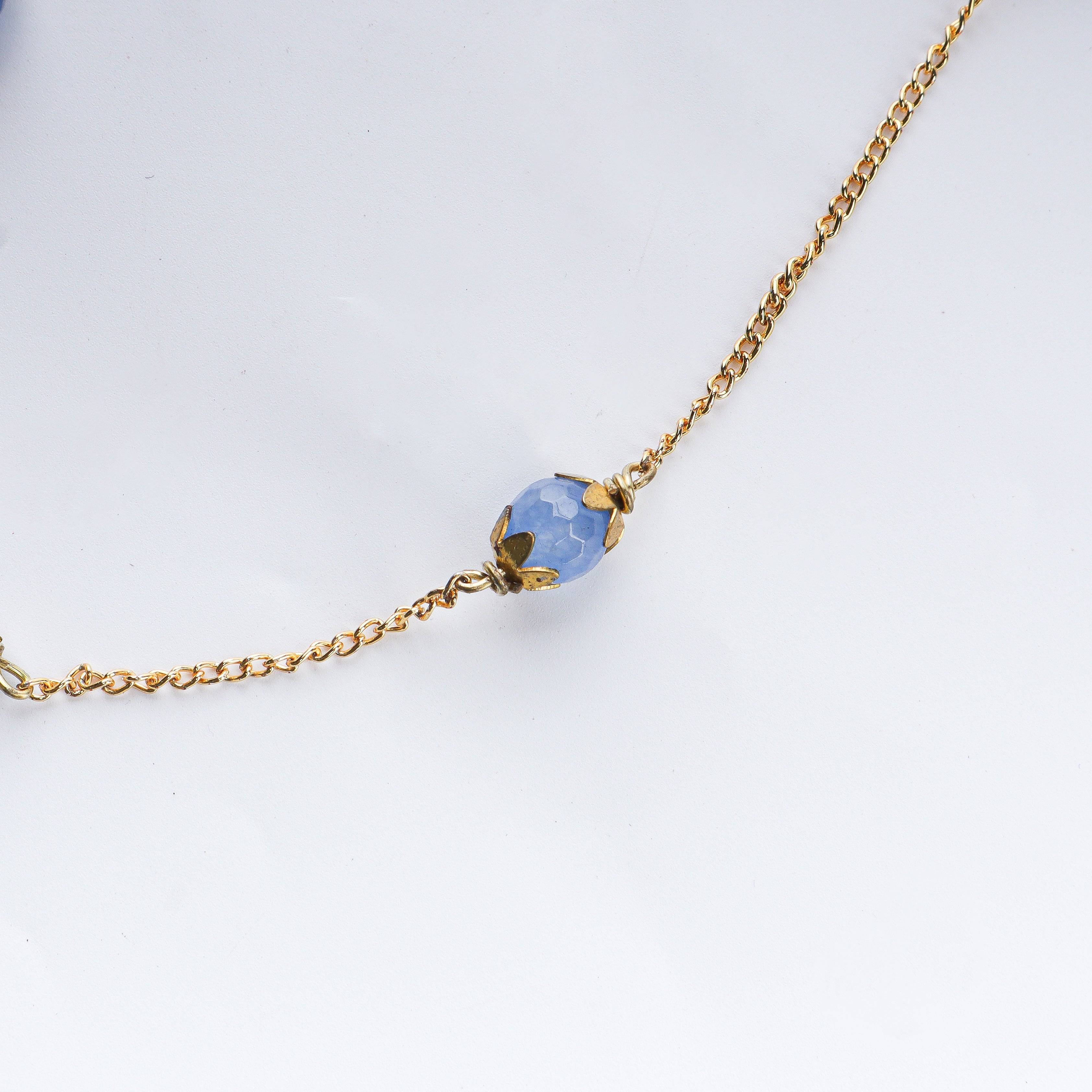 Close-up of 22K gold-plated fashion necklace showcasing intricate detailing, fine craftsmanship, and rich 22K gold plating