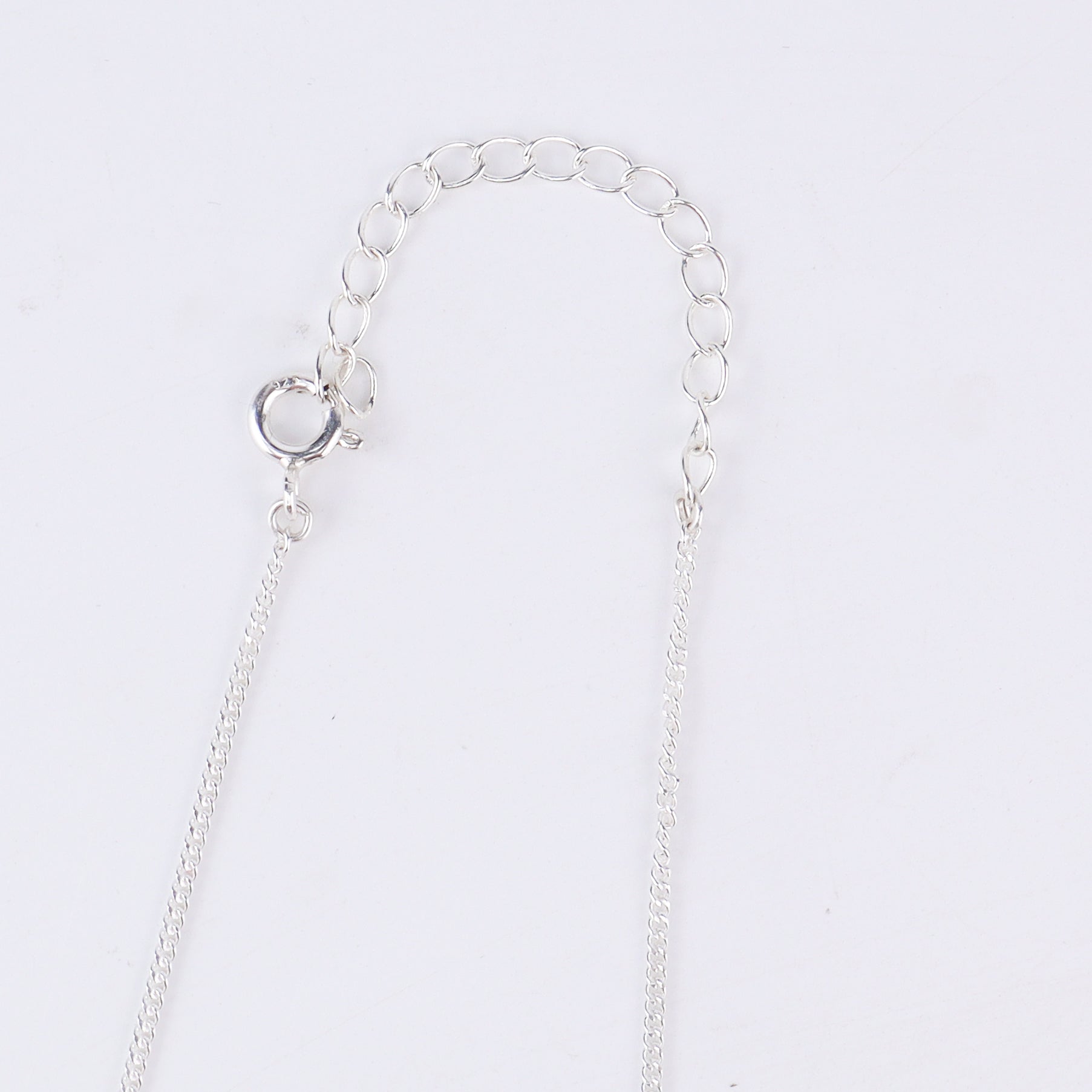 Moon silver pendant styled with dress and modern outfit