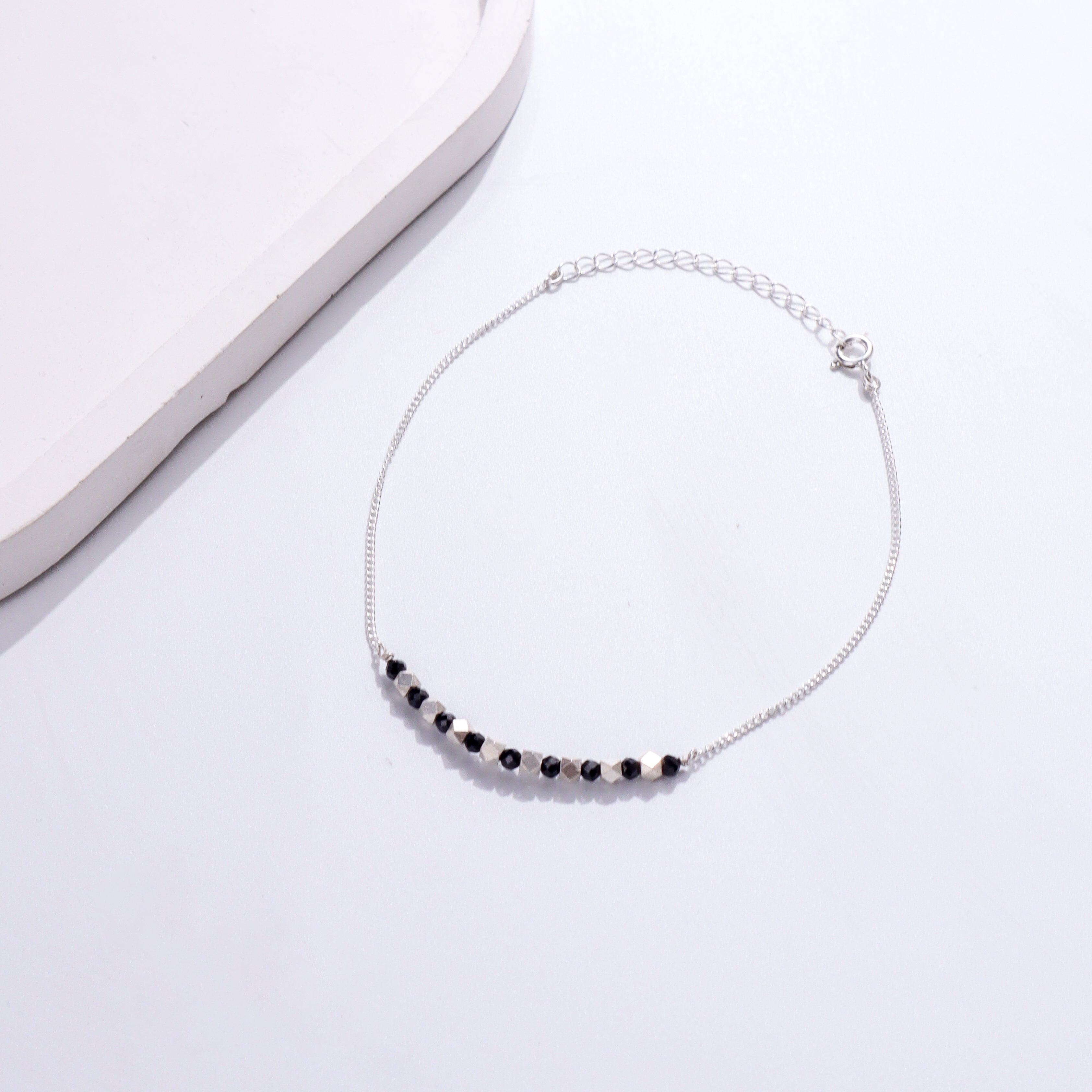 Silver chain anklet with black and silver beads
