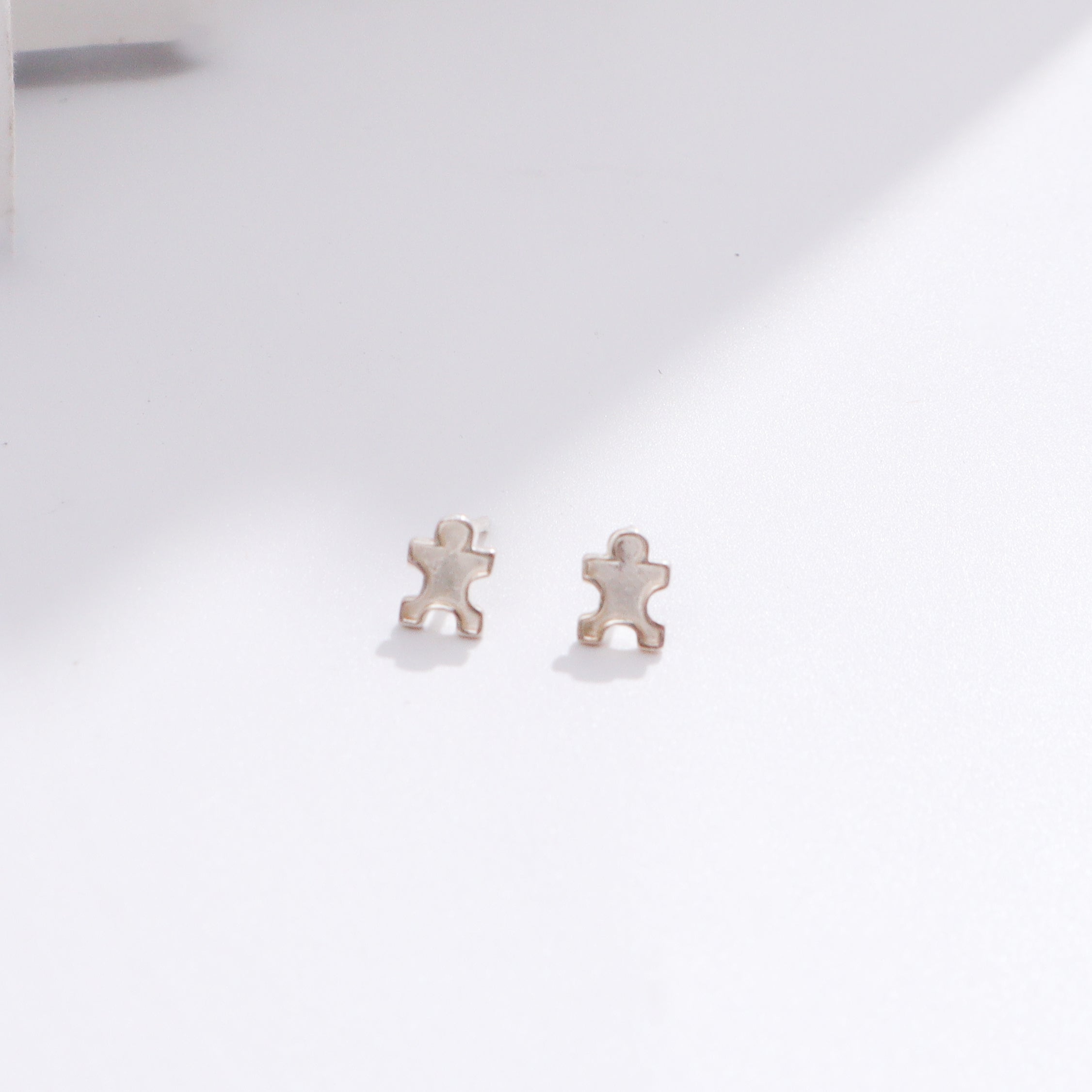 Silver puzzle earrings