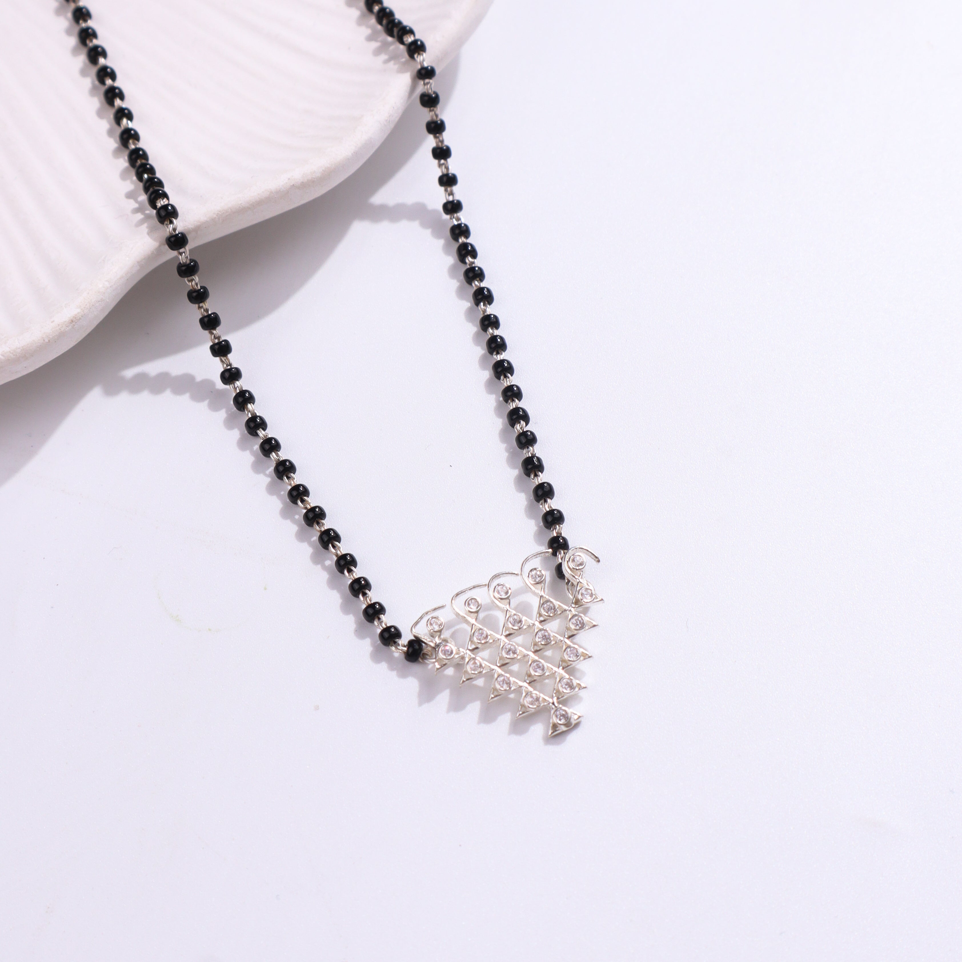 Silver CZ Saraswati Mangalsutra with black beads and crystal pendant