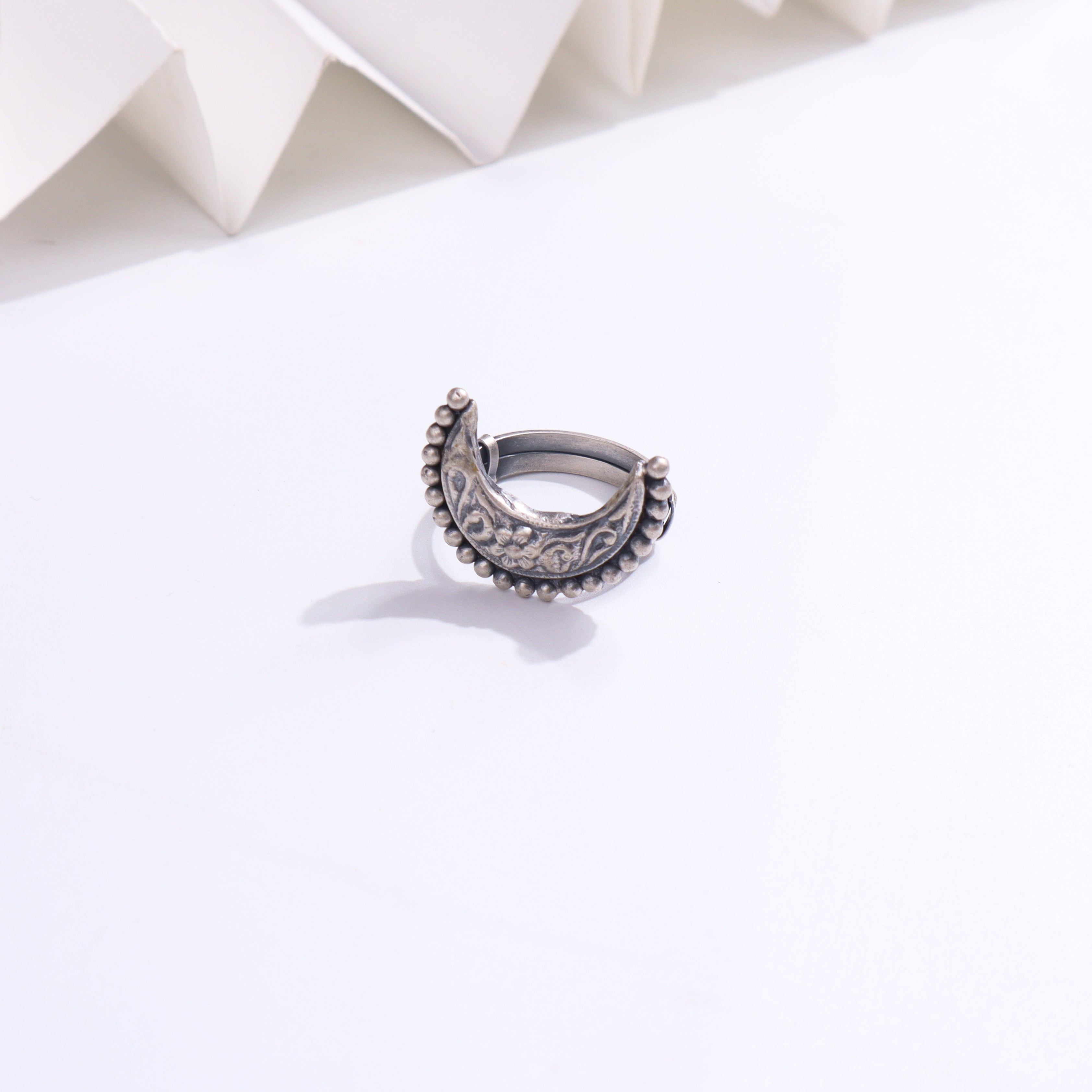 Silver handcrafted ring with intricate design