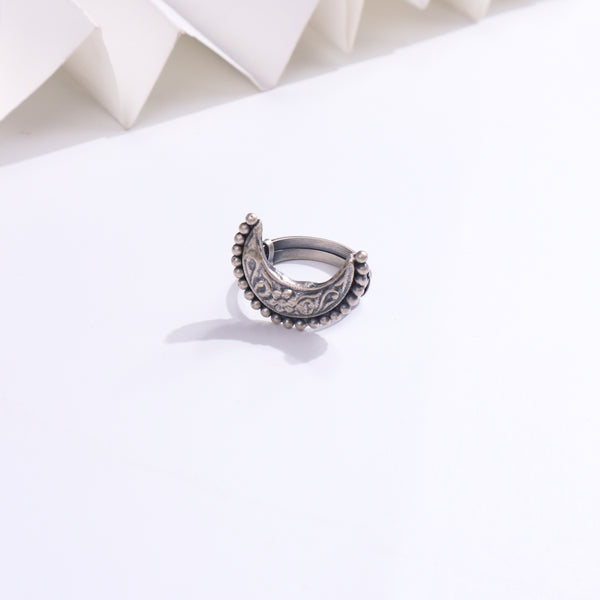 Silver handcrafted ring with intricate design