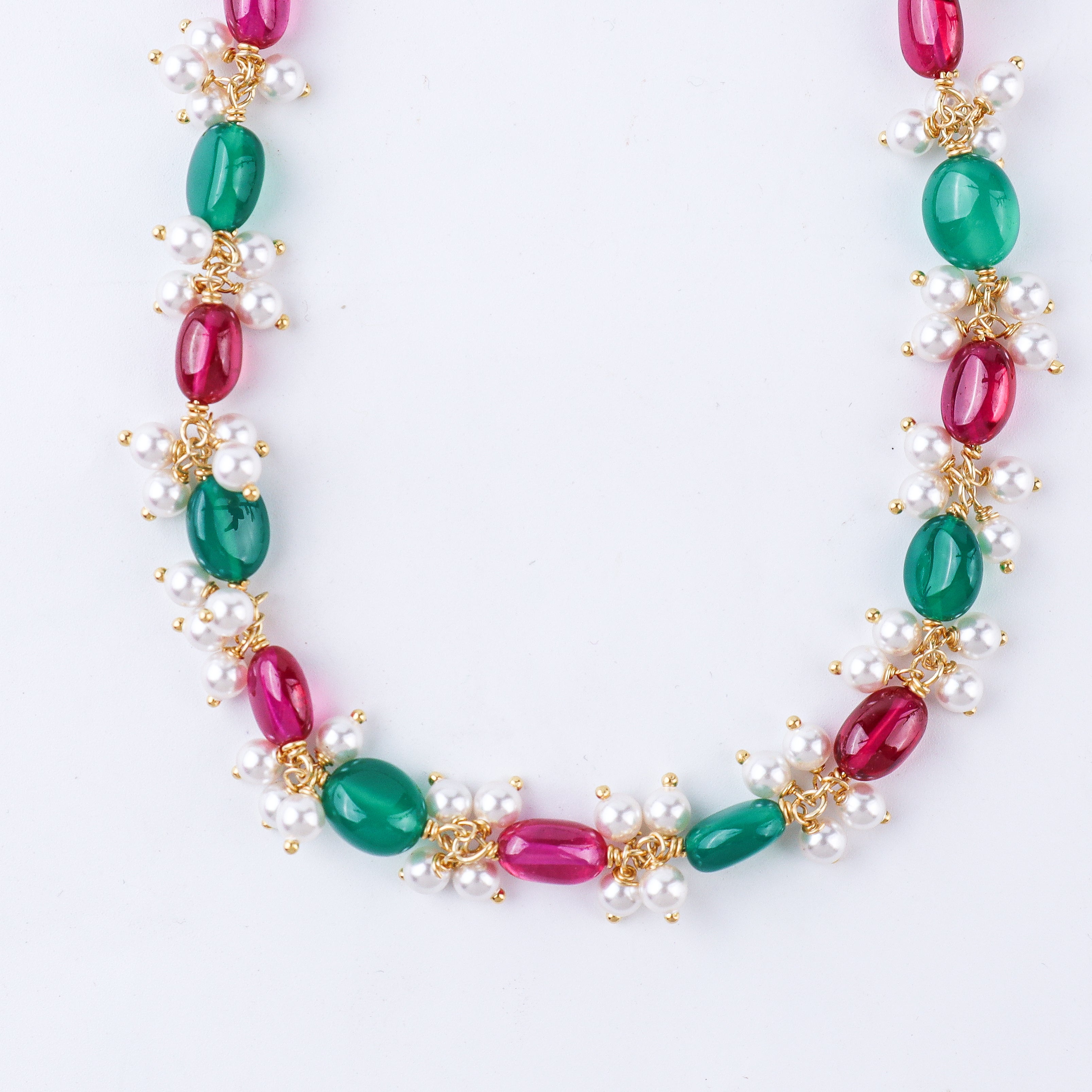 Green onyx ruby pearl silver necklace close-up handcrafted detailing