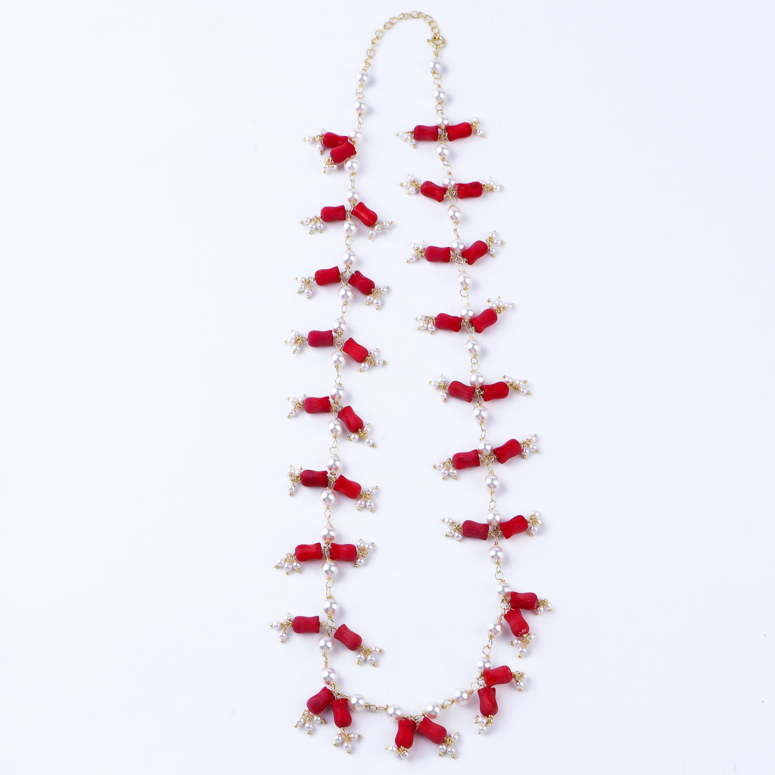 Handcrafted luxe necklace with coral and pearls polished finish