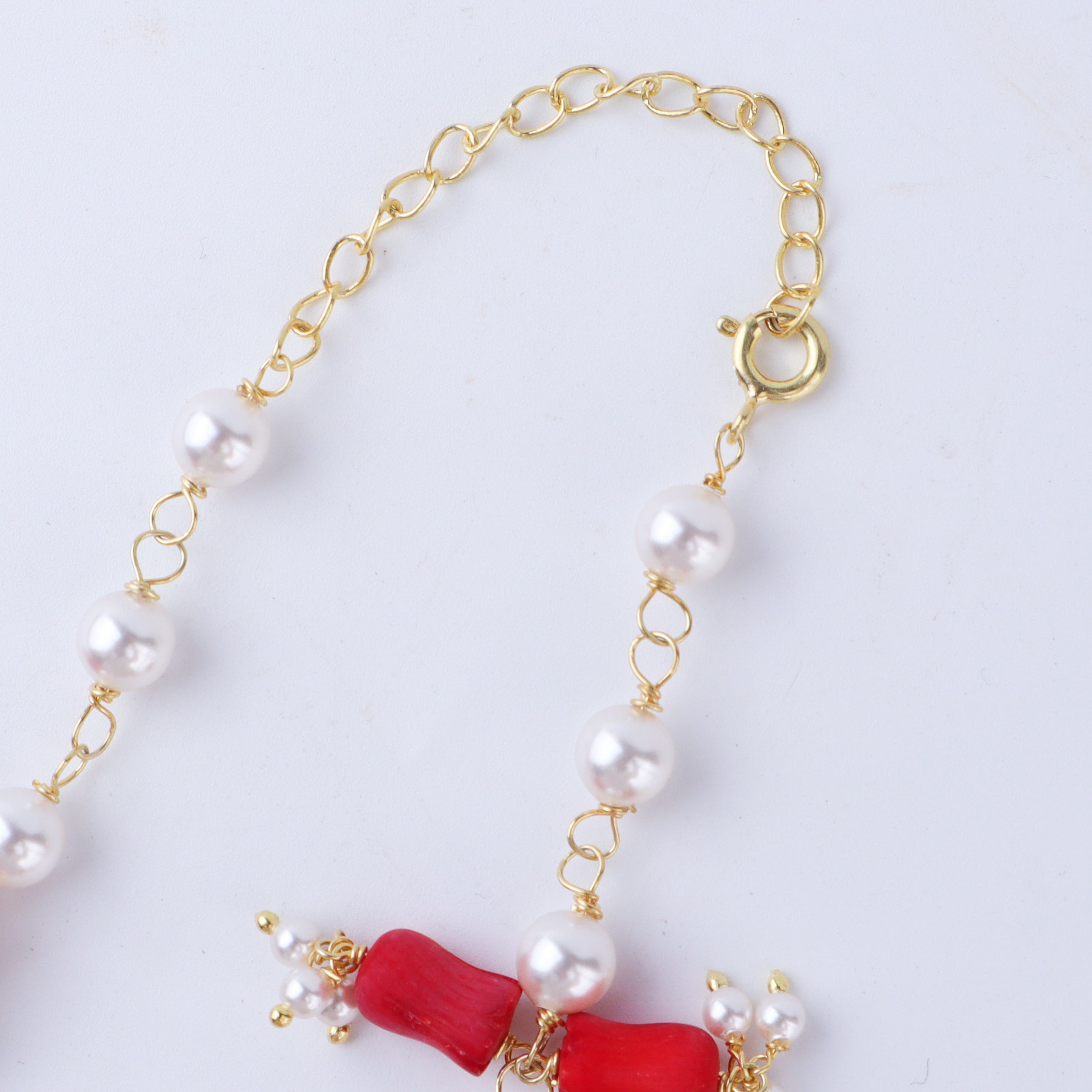 Model wearing Luxe Coral & Pearl Necklace for festive look