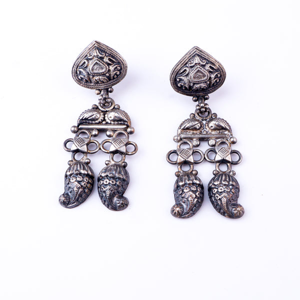 Silver earrings with intricate design