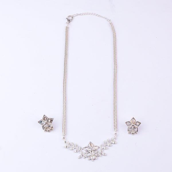 Silver jewelry set with necklace, earrings, and bracelet with moissanite stones