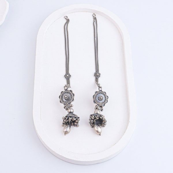 Angled view of Antique Silver Earrings in 92.5 sterling silver highlighting the detailed vintage design