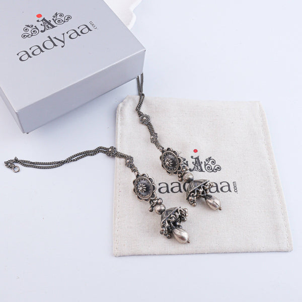 Detailed view of Antique Silver Earrings highlighting intricate motifs, textured surface, and antique silver finish