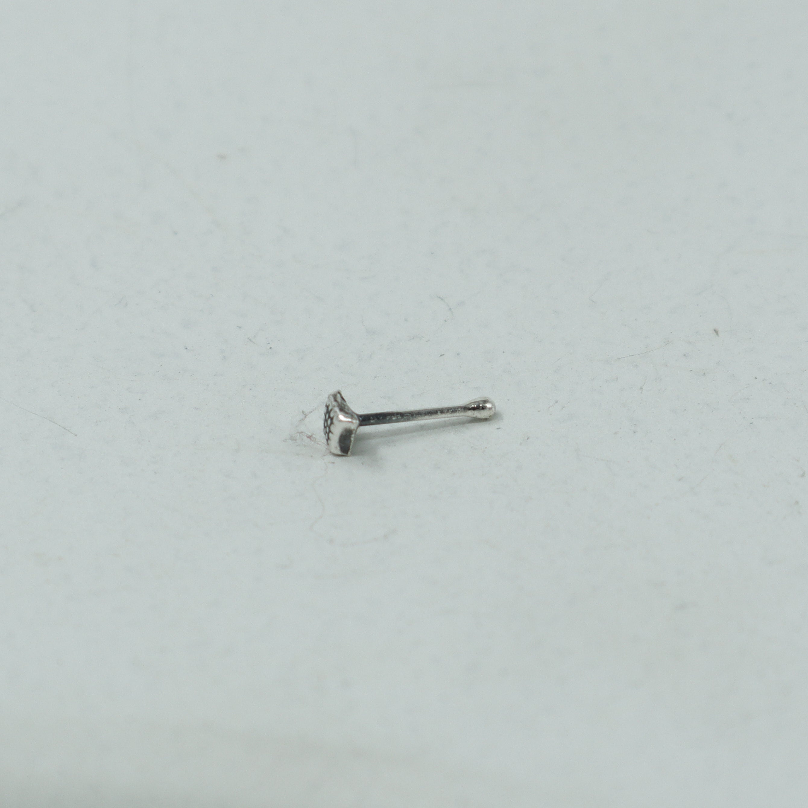 Silver Dotted Diamond Nose pin