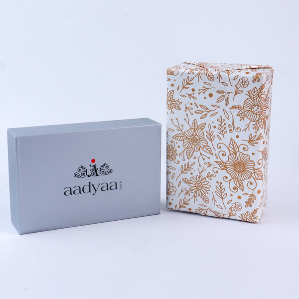 Close-up of Gift Wrap detailing with ribbon and tag