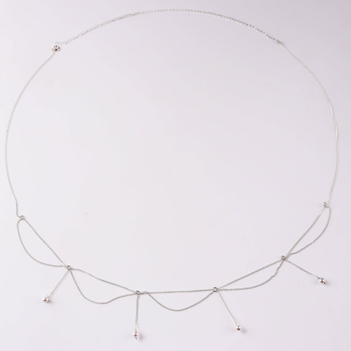 Silver waist chain with pearl jhalar for traditional jewelry