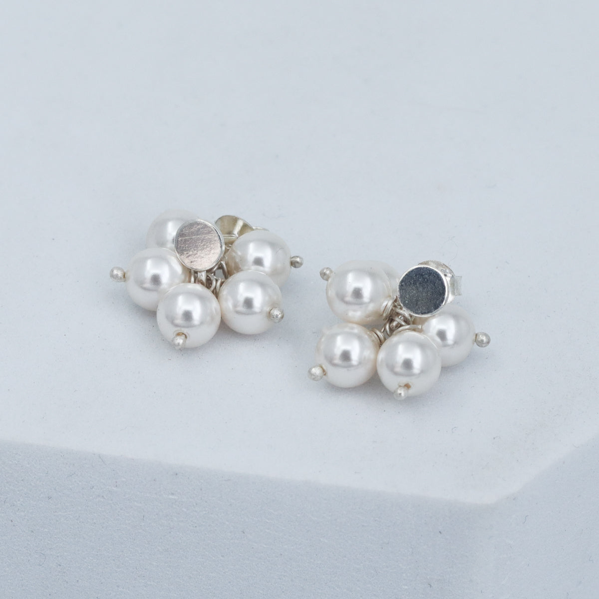 Tiny pearl silver studs design