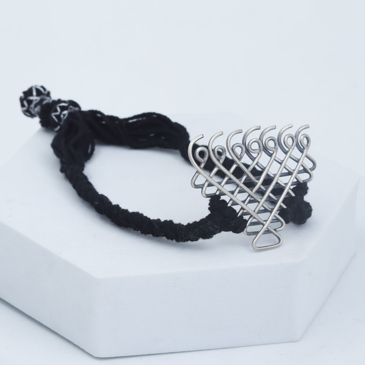 Handcrafted silver Saraswati bracelet black thread polished finish