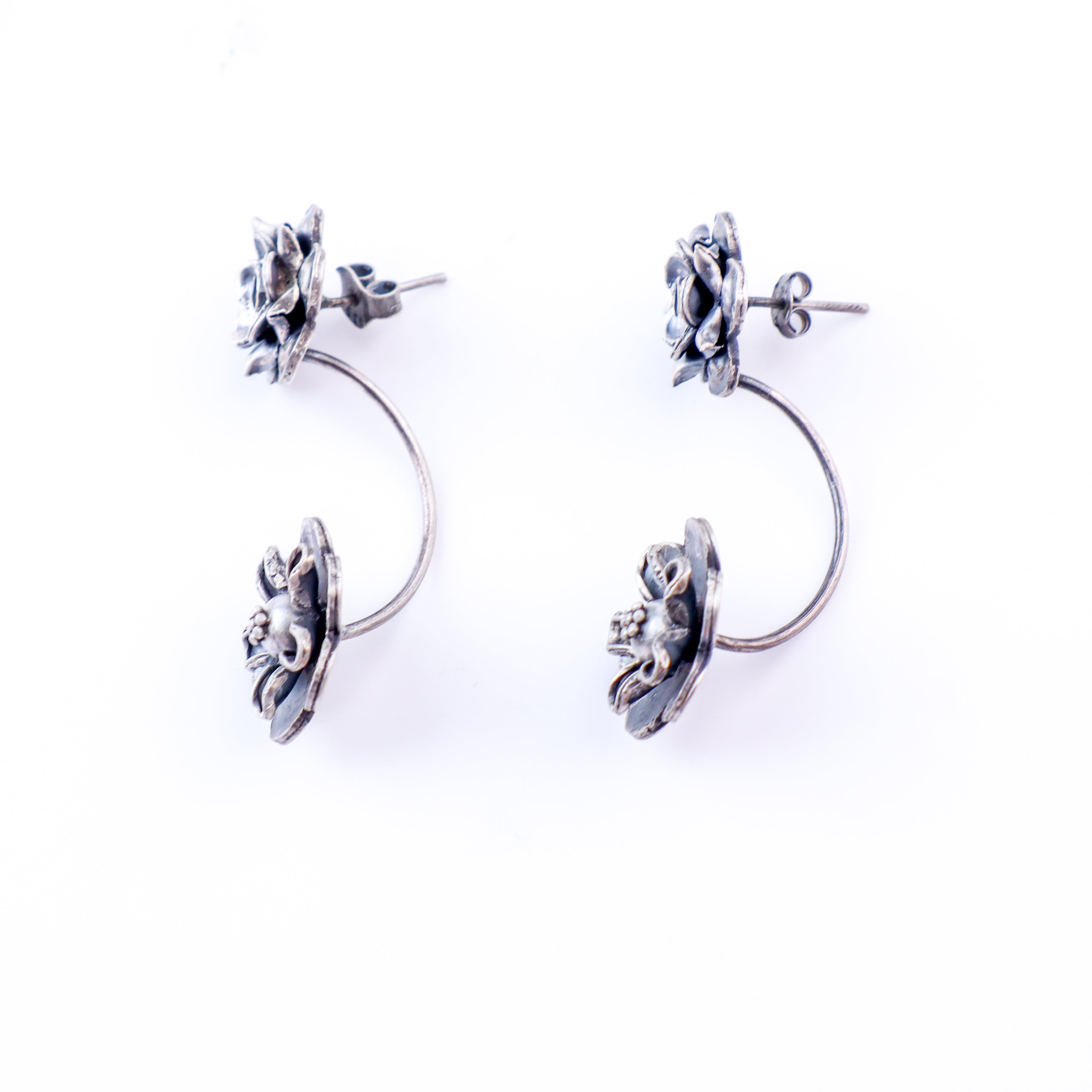 wear oxidized dual flower earrings for ethnic styling