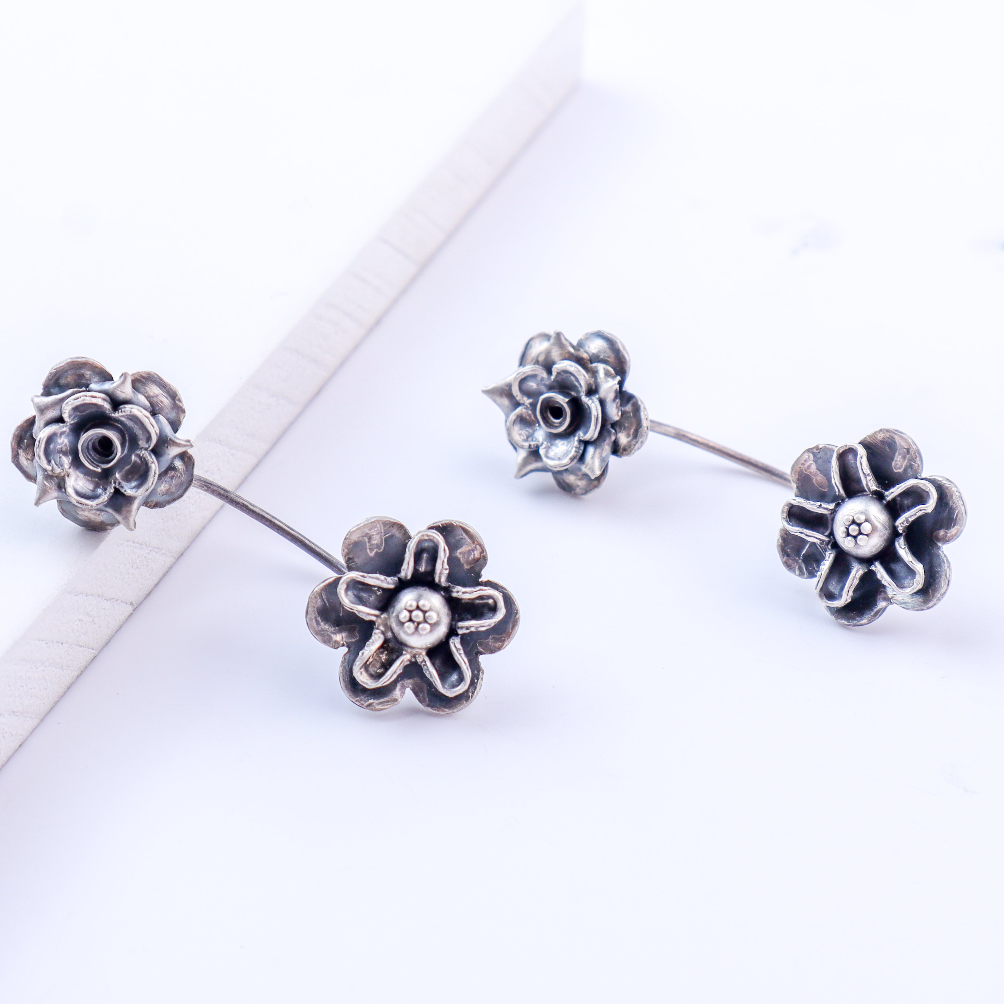 Oxidized dual flower earrings styled with saree and kurta