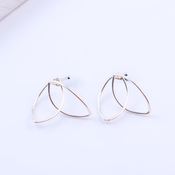 Petal arc hoops styled with modern outfit