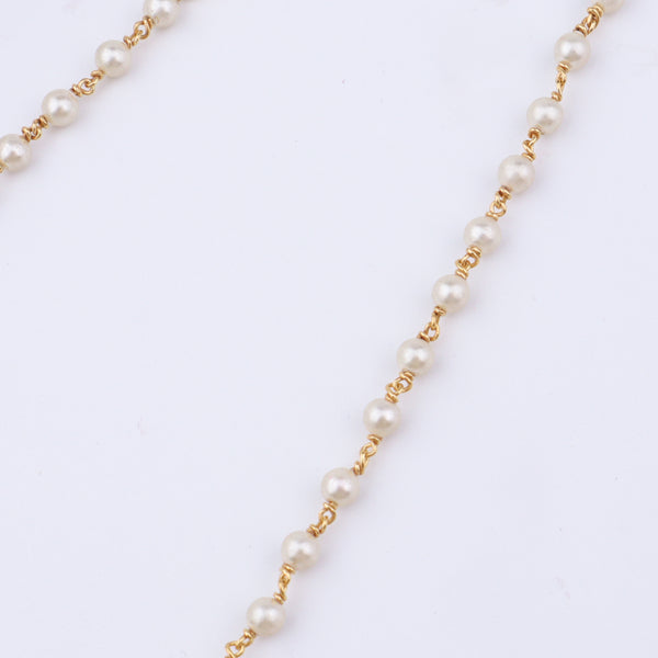 Elegant pearl and gold chain with adjustable clasp