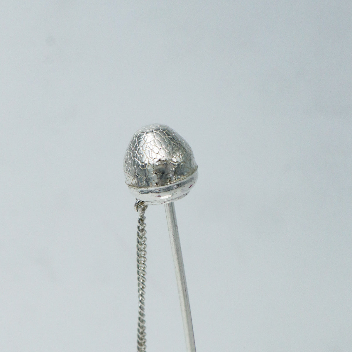 Silver betel leaf holder placed on pooja thali