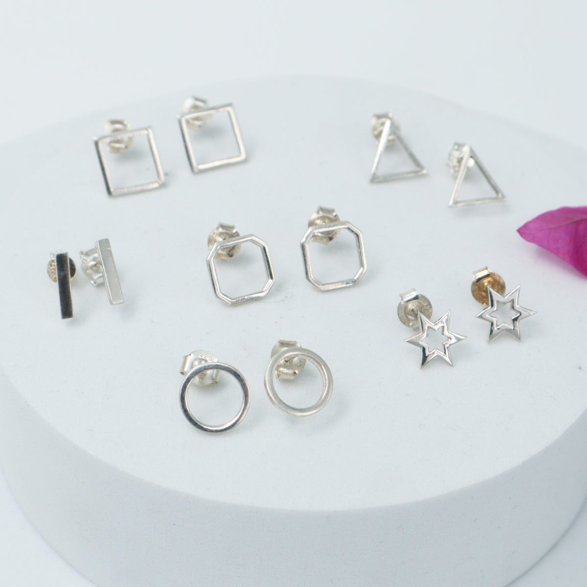 Handcrafted geometric silver earrings polished finish