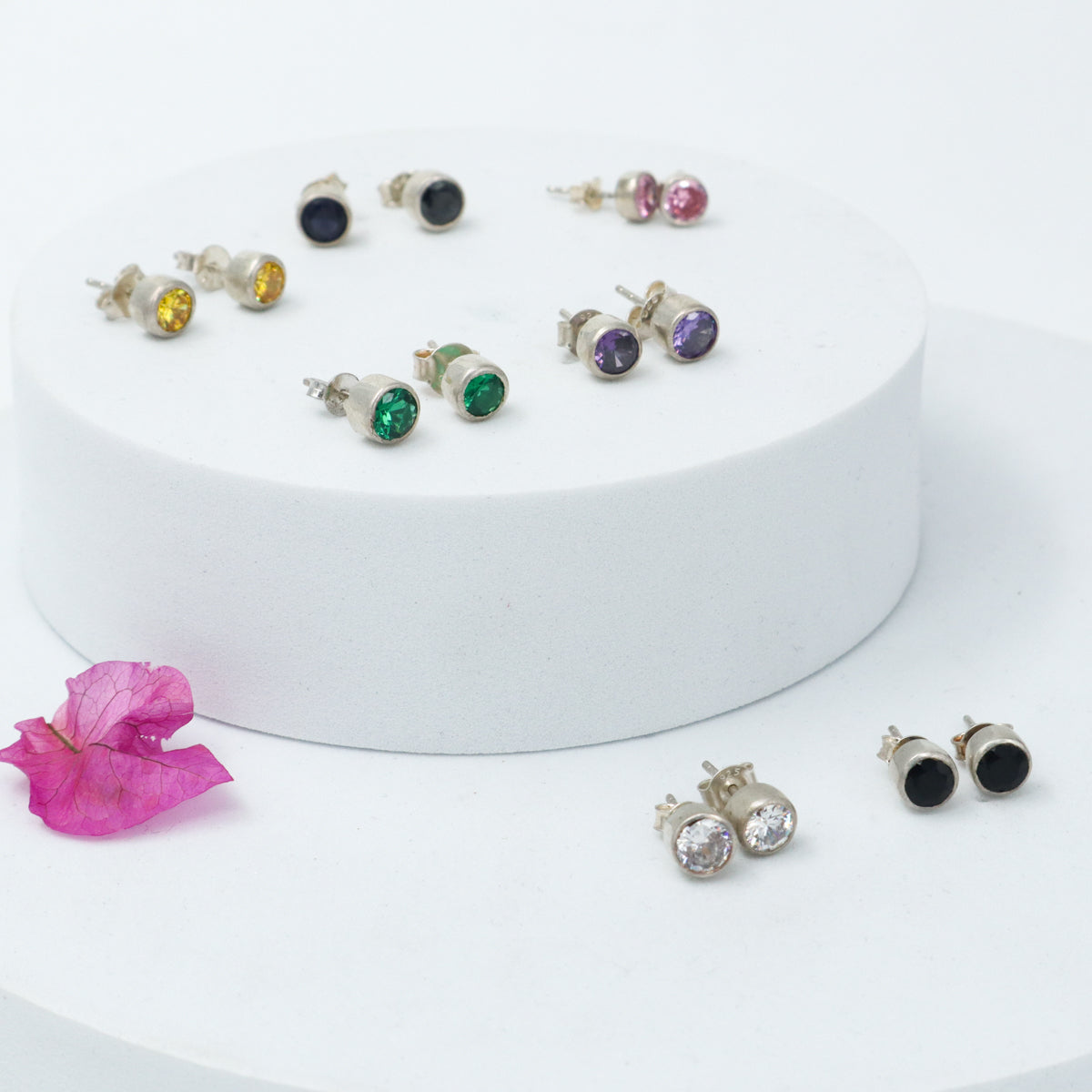 Handcrafted rainbow CZ silver studs polished finish