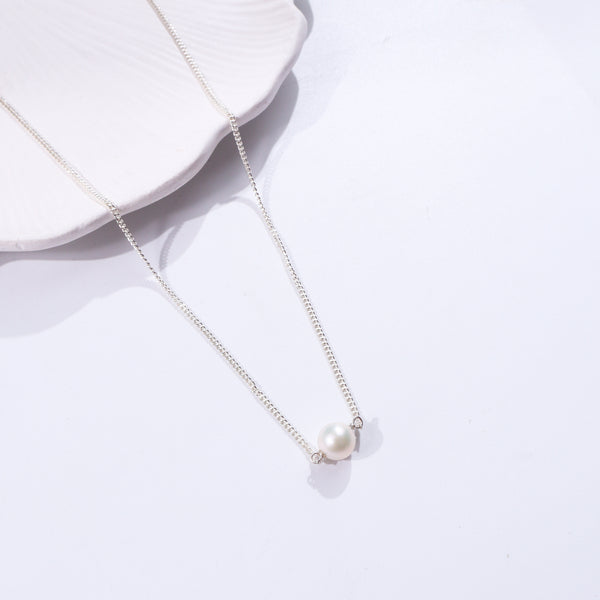 Sterling silver pearl necklace with pendant