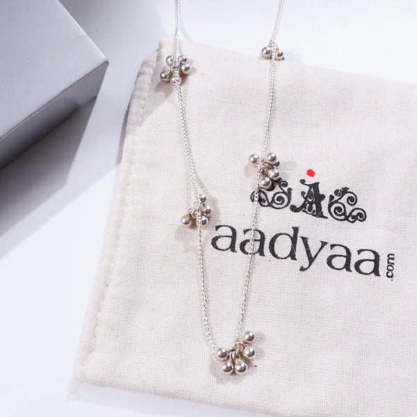 Silver necklace with small ghungroo beads and shiny finish