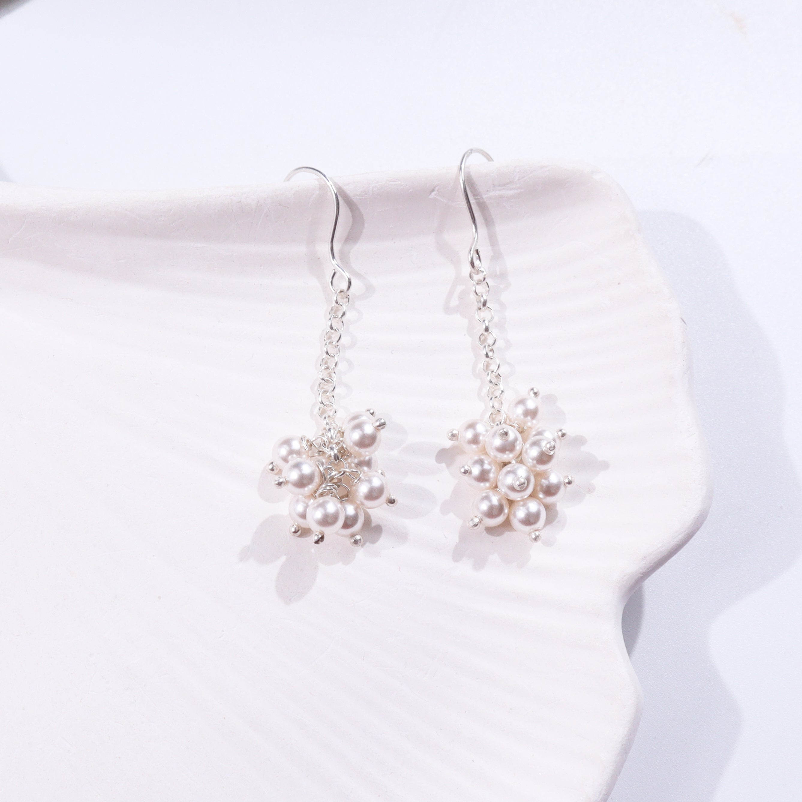Pearl drop earrings with silver chain